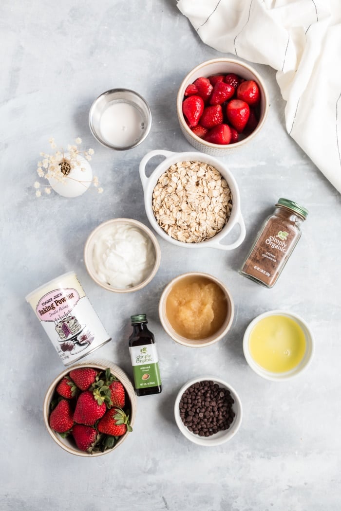 ingredients for strawberry pancakes on a board
