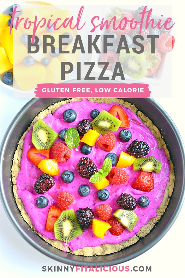 Tropical Smoothie Berry Breakfast Pizza made with a gluten free oat crust and topped with a Greek yogurt dragon fruit smoothie and fresh fruit. A delicious breakfast or dessert for summer that's made in a blender! Gluten Free + Low Calorie