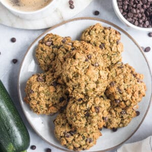 Healthy Zucchini Chocolate Cookies are low calorie, gluten free and packed with oats and chocolate flavor. A chewy, healthy oatmeal cookie recipe!
