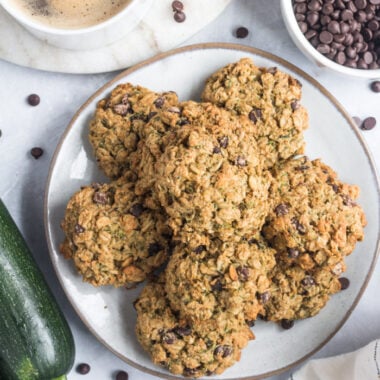 Healthy Zucchini Chocolate Cookies are low calorie, gluten free and packed with oats and chocolate flavor. A chewy, healthy oatmeal cookie recipe!