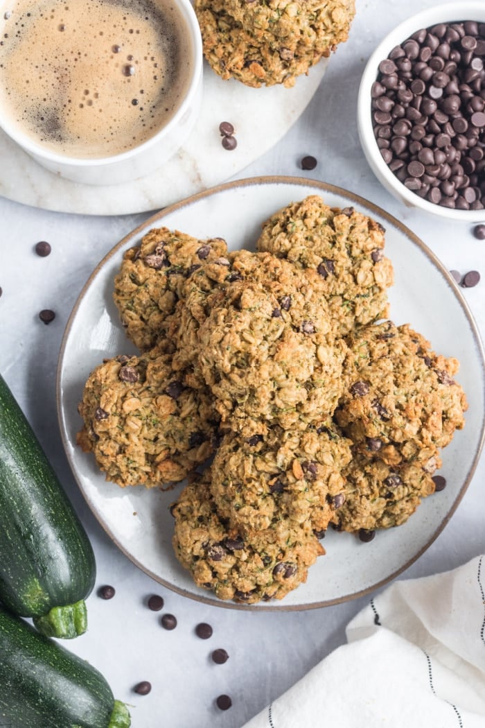 Healthy Zucchini Chocolate Cookies are low calorie, gluten free and packed with oats and chocolate flavor. A chewy, healthy oatmeal cookie recipe!