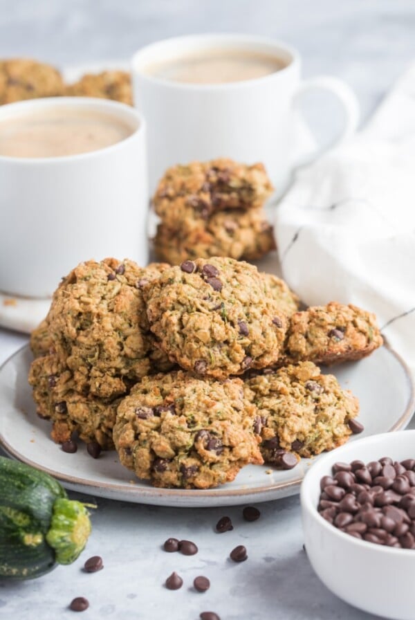 Healthy Zucchini Chocolate Cookies are low calorie, gluten free and packed with oats and chocolate flavor. A chewy, healthy oatmeal cookie recipe!