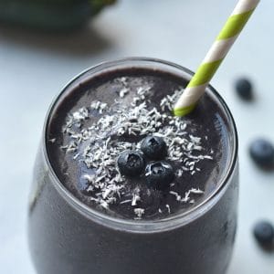 Blueberry Protein Smoothie made with zucchini! High protein, high in Vitamin C and antioxidants. An on the go smoothie, perfect for breakfast and a great way to sneak in vegetables! Gluten Free + Vegan + Paleo option