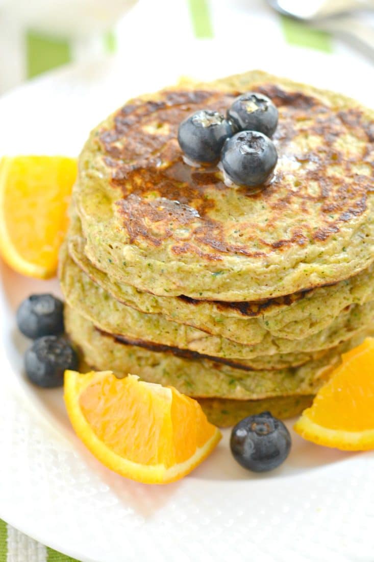 Zucchini Greek Yogurt Pancakes are packed with protein, whole grains and fiber. A mouthwatering stack that's fluffy on the outside & creamy on the inside. A great low calorie breakfast to start your day!