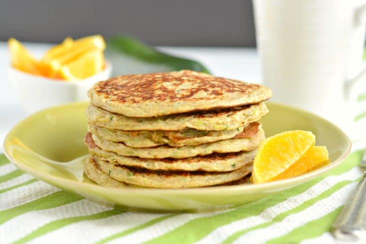 Zucchini Greek Yogurt Pancakes are packed with protein, whole grains and fiber. A mouthwatering stack that's fluffy on the outside & creamy on the inside. A great low calorie breakfast to start your day!