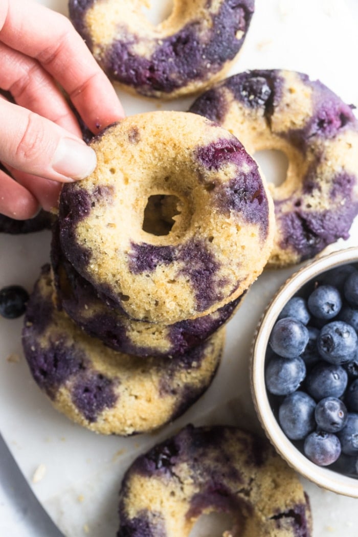 Blueberry Chickpea Donuts are backed for a healthier donut that is low calorie, low in sugar, naturally gluten free and delicious! No one will ever guess these donuts are made with chickpeas!