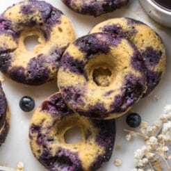 Blueberry Chickpea Donuts are backed for a healthier donut that is low calorie, low in sugar, naturally gluten free and delicious! No one will ever guess these donuts are made with chickpeas!