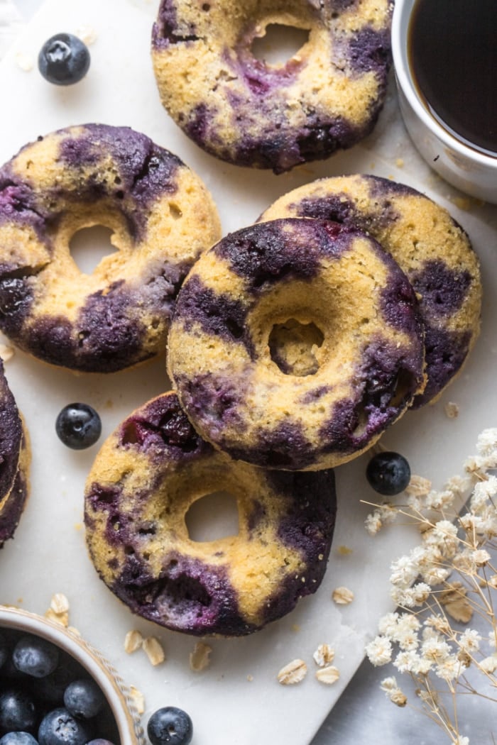 Blueberry Chickpea Donuts are backed for a healthier donut that is low calorie, low in sugar, naturally gluten free and delicious! No one will ever guess these donuts are made with chickpeas!