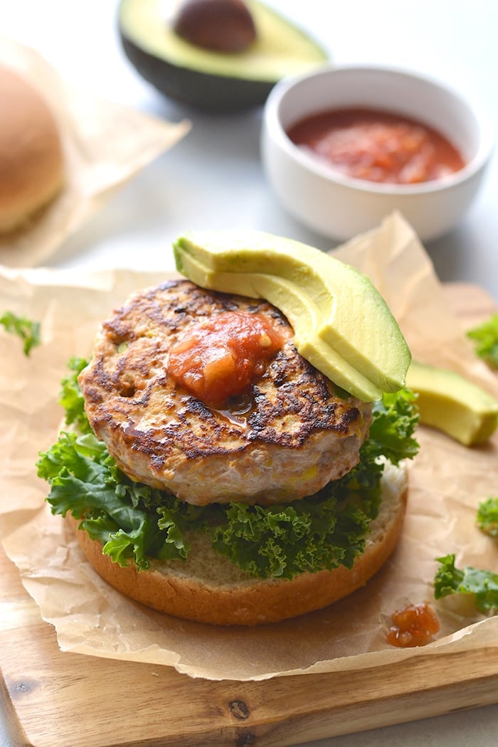 Low Carb Chicken Guacamole Burgers! Stuffed with avocado and salsa, these easy burgers are juicy, tender and bursting with flavor.