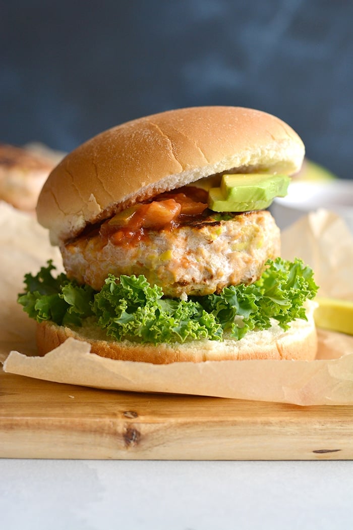 Low Carb Chicken Guacamole Burgers! Stuffed with avocado and salsa, these easy burgers are juicy, tender and bursting with flavor.