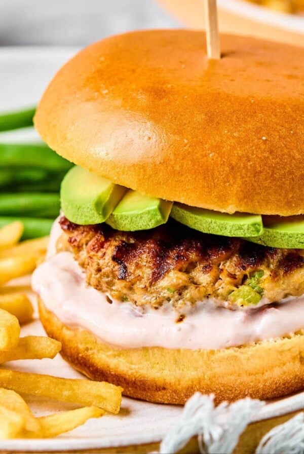 Low Carb Chicken Guacamole Burgers! Stuffed with avocado and salsa, these easy burgers are juicy, tender and bursting with flavor.