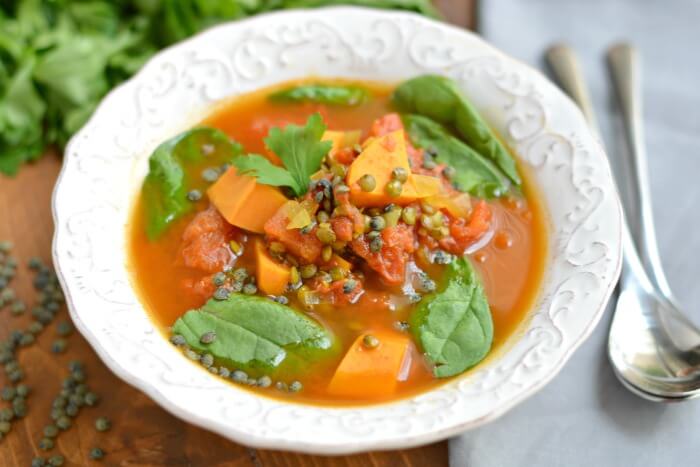 Low fat Lentil Sweet Potato Soup is a one pot wonder! Bursting with flavorful comforting spices, this 30 minute soup makes a satisfying vegan meal.