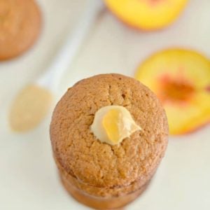 Peach Cashew Muffins made extra creamy with cashew butter. A mildly sweet, healthy muffin that makes a nutritious on the go snack! Gluten free and low calorie!