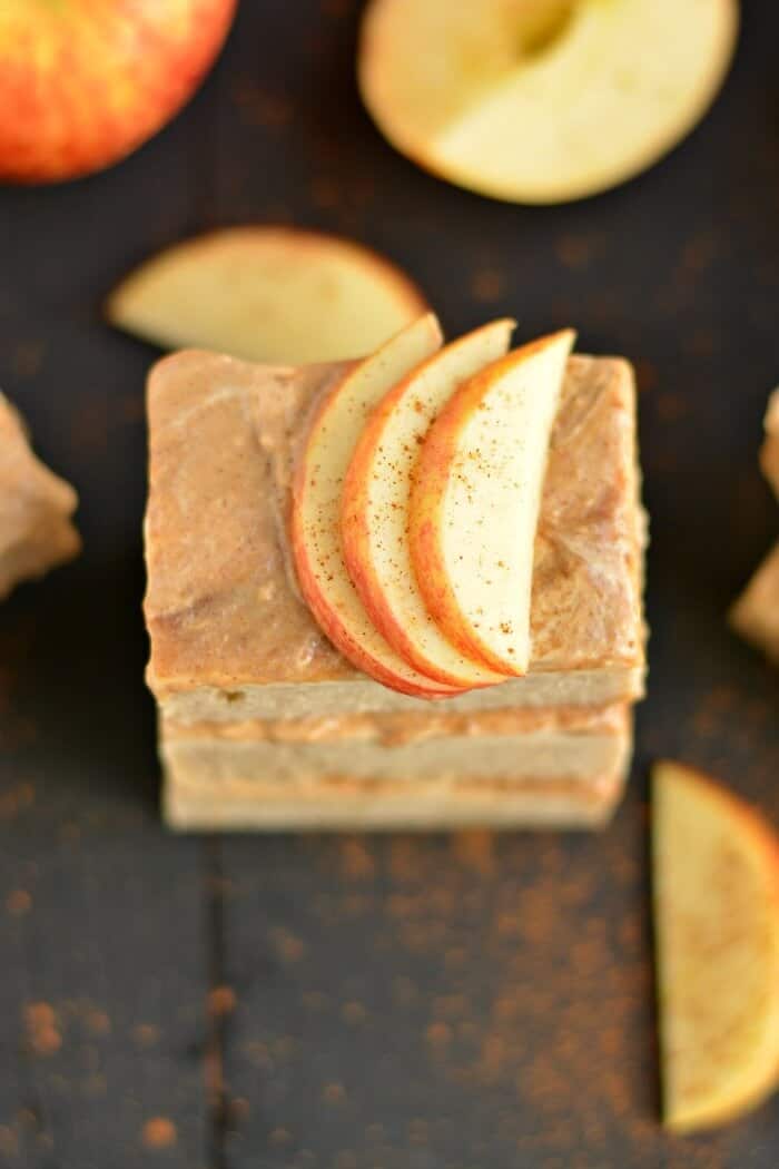 Greek Apple Cinnamon Cheesecake Bars are a lighter version of classic cheesecake. Spiced with fall flavors and made with Greek cream cheese, this healthier dessert is a party favorite! Gluten Free + Low Calorie