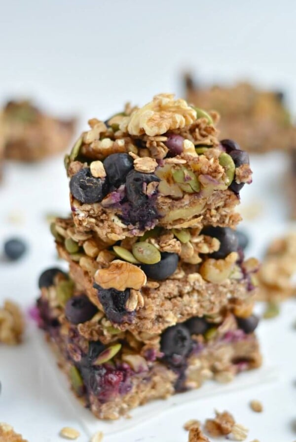 Take your granola bars up a notch with a chewy, oven-baked these Blueberry Protein Walnut Breakfast Bars packed nutrients & antioxidants! Made with a protein-walnut-oat base and topped with a blueberry, walnut & oat crumble this breakfast has everything & more! Gluten Free + Vegan + Low Calorie