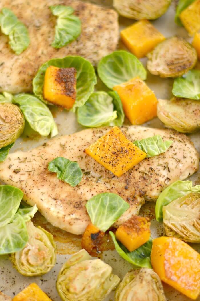 This One Pan Chicken Brussels Sprouts & Butternut Squash is perfectly baked on a single pan for an EASY and filling dinner. A Paleo, Gluten Free & Low Calorie meal that takes 30 minutes, ideal for any weeknight meals or meal prepping!