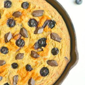 Pumpkin Blueberry Chocolate Skillet Cake! Savor the flavors of fall with swirls of pumpkin and rings of blueberries & chocolate in a thick coconut flour skillet cake that's healthy, EASY & addicting! The perfect Paleo + Gluten Free fall breakfast, dessert or snack.