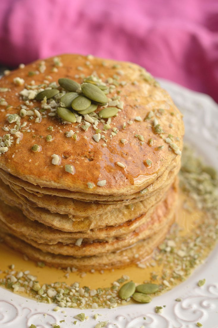 Fluffy Pumpkin Protein Pancakes made with cottage cheese and fall inspired flavors, make a high protein breakfast. A healthy way to start your day! Low Calorie + Gluten Free