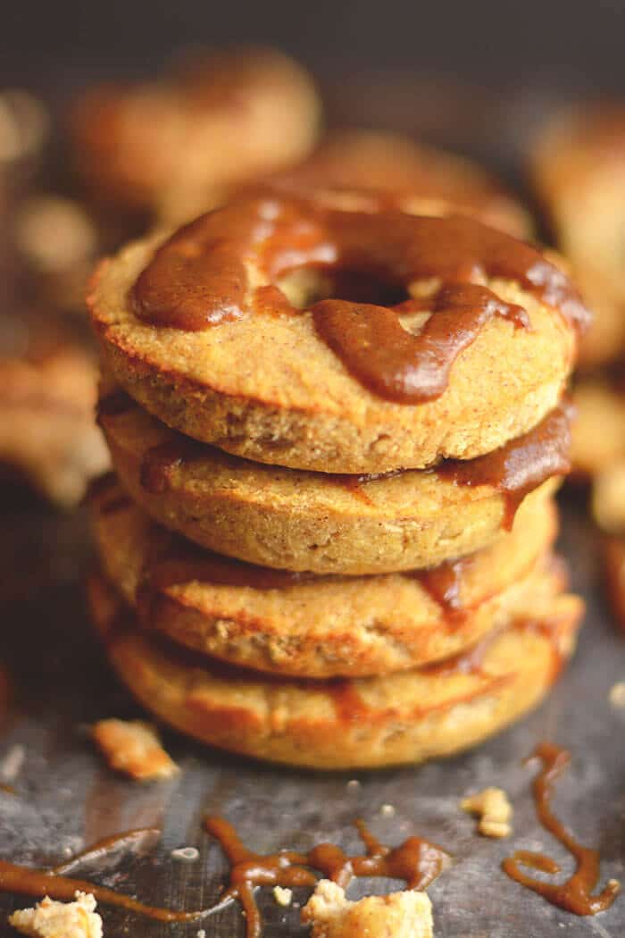 Paleo Apple Cider Vinegar Donuts drizzled in turmeric pumpkin spice latte! These grain and sugar free donuts are loaded with fiber, protein and amazing health benefits. A simple every day healthy donut recipe! Gluten Free + Low Calorie + Paleo + Sugar Free