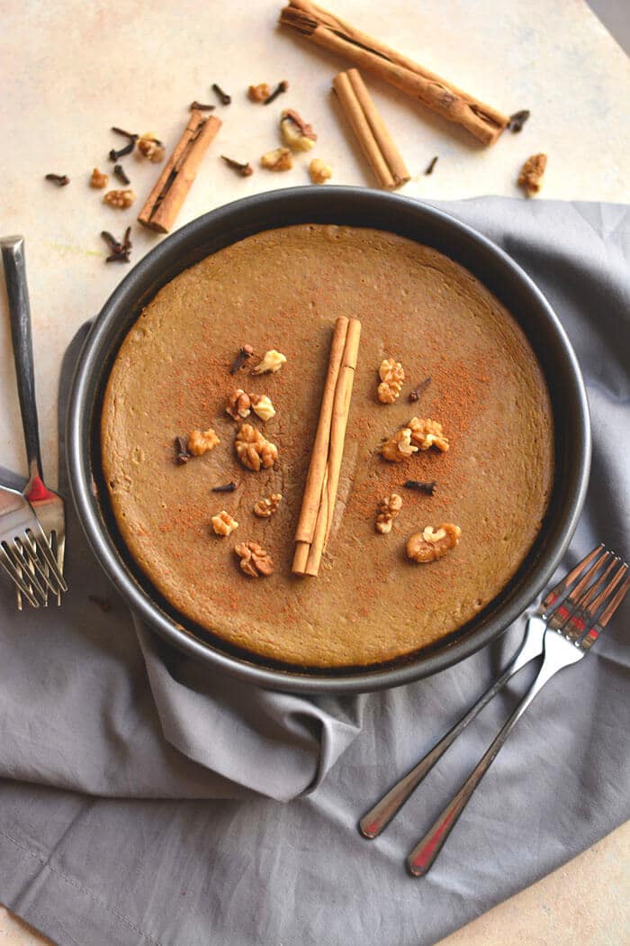 This Healthy Pumpkin Pie made with an addicting walnut date crust & topped with pumpkin custard is super easy to make & so delicious you won't want to share! What pumpkin pie dreams are made of! Gluten Free + Low Calorie + Paleo