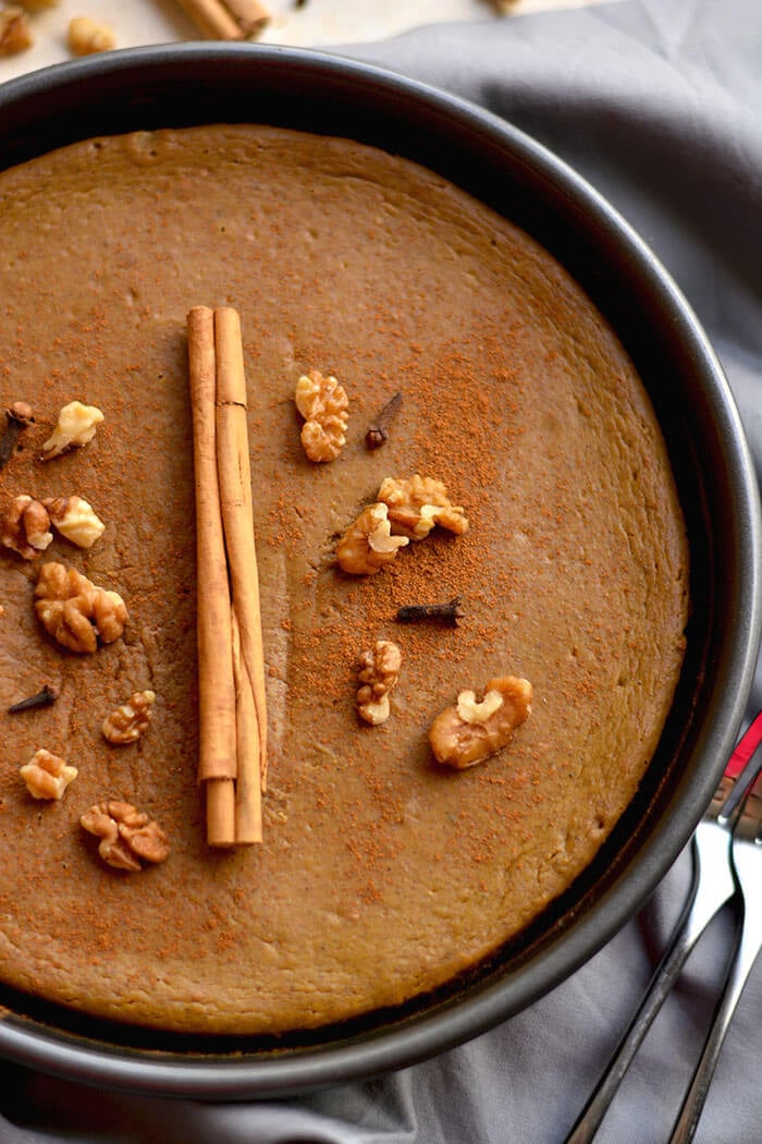 This Healthy Pumpkin Pie made with an addicting walnut date crust & topped with pumpkin custard is super easy to make & so delicious you won't want to share! What pumpkin pie dreams are made of! Gluten Free + Low Calorie + Paleo