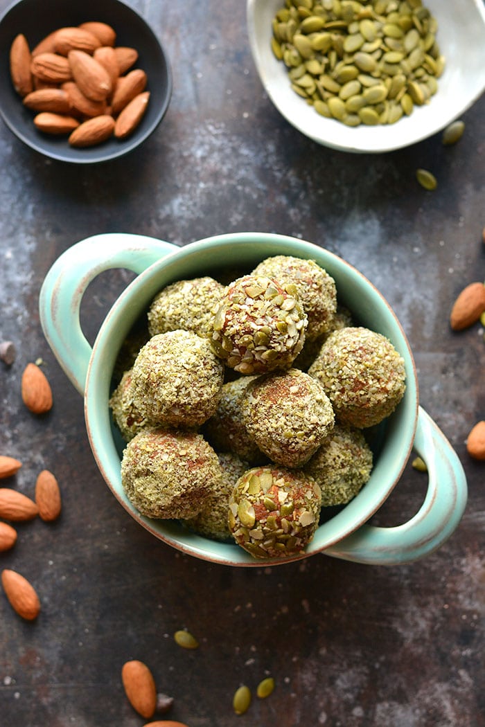 Pumpkin Cookie Dough Bites packed with a nutty, oat crunch and filled with warm, fall spices. A chocolate treat that's deceptively healthy! Gluten Free + Low Calorie + Vegan