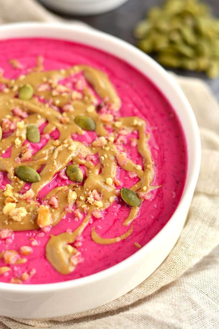 This pretty in pink Pumpkin Pitaya Smoothie Bowl makes pumpkin eating fun. High in protein & packed with nutrients, this will be your fall favorite!