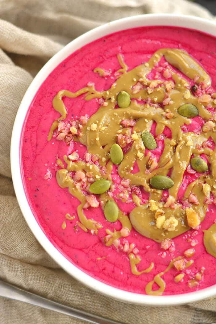 This pretty in pink Pumpkin Pitaya Smoothie Bowl makes pumpkin eating fun. High in protein & packed with nutrients, this will be your fall favorite!