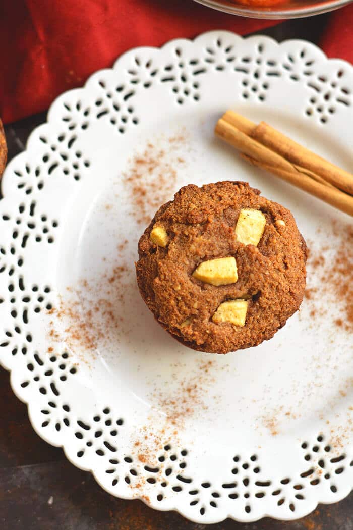 Warm Paleo Apple Cinnamon Muffins bursting with natural sweetness! Made with almond flour, these muffins are thick, hearty & make the perfect single-serve dessert or snack! Gluten Free + Low Calorie + Paleo
