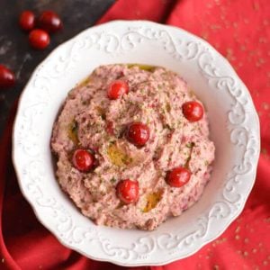 Spice things up with a Cranberry Hummus! This twist on traditional hummus makes a tasty holiday appetizer or winter snack, & guaranteed to add a kick to your plate! Gluten Free + Low Calorie + Vegan
