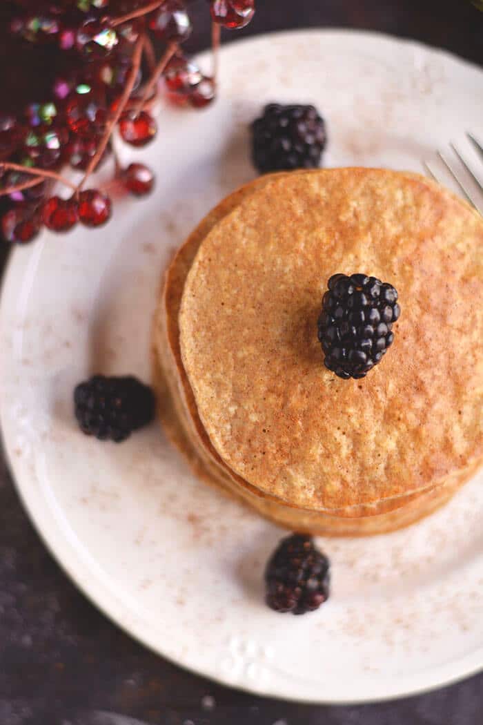 Bursting with winter spices, these Gingerbread Protein Pancakes are cozy, comforting & healthy! A seasonal protein packed breakfast that's easy & delicious! Gluten Free + Low Calorie + Dairy Free