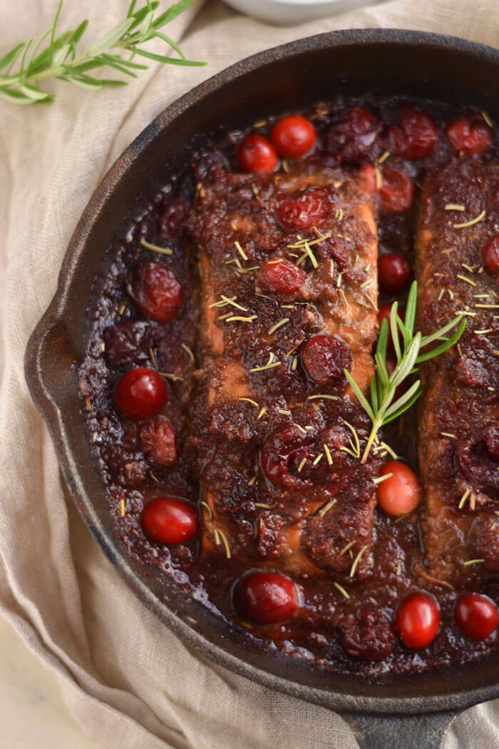Skillet Cranberry Balsamic Salmon! This ONE skillet roasted balsamic salmon infused with maple syrup & cranberries is a simple 30 minute sweet & pungent dinner. Perfect for holiday & winter dinner menus! Paleo + Gluten Free + Low Calorie! 