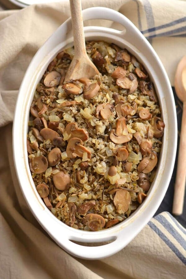 This Classic & Healthy Wild Rice Casserole is made with mushrooms & onions. A hearty vegetarian or side dish that's easy to make & guaranteed to please a crowd. Gluten Free + Low Calorie + Vegan