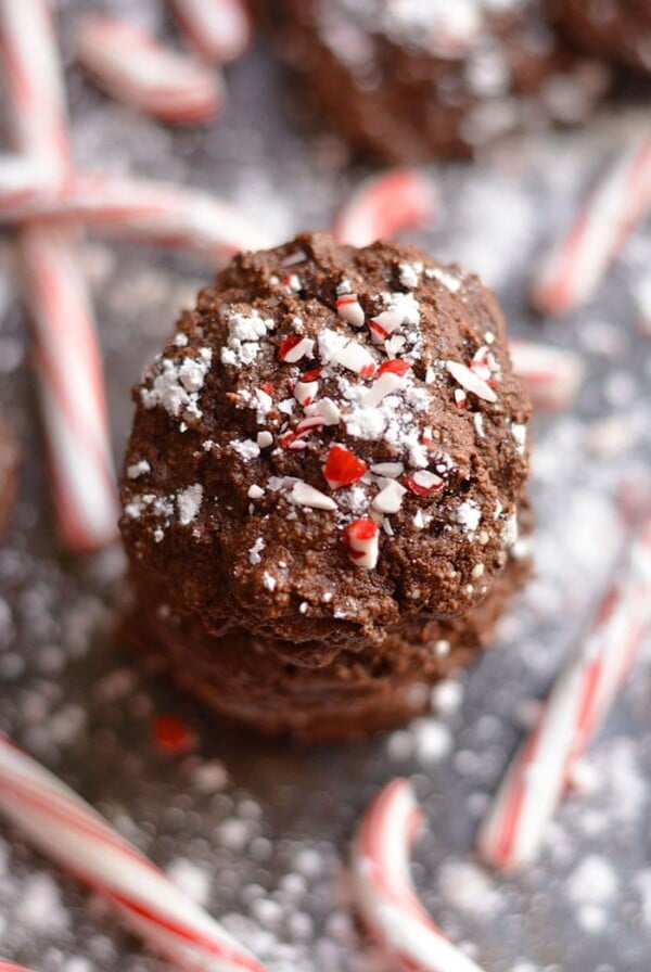Healthy Chocolate Crinkle Cookies! Made lower in sugar & nutritious with almond & coconut flour, these fudge-like cookies are so chocolaty good they're hard to resist! Gluten Free + Low Calorie + Paleo