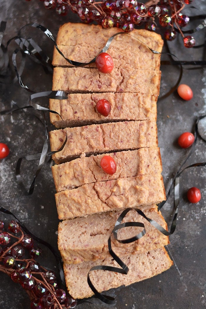 Skinny Cranberry Coconut Bread made low in sugar with healthy, wholesome ingredients. The perfect thick & chewy bread to celebrate the holidays, and makes a great gift! Gluten Free + Low Calorie + Paleo