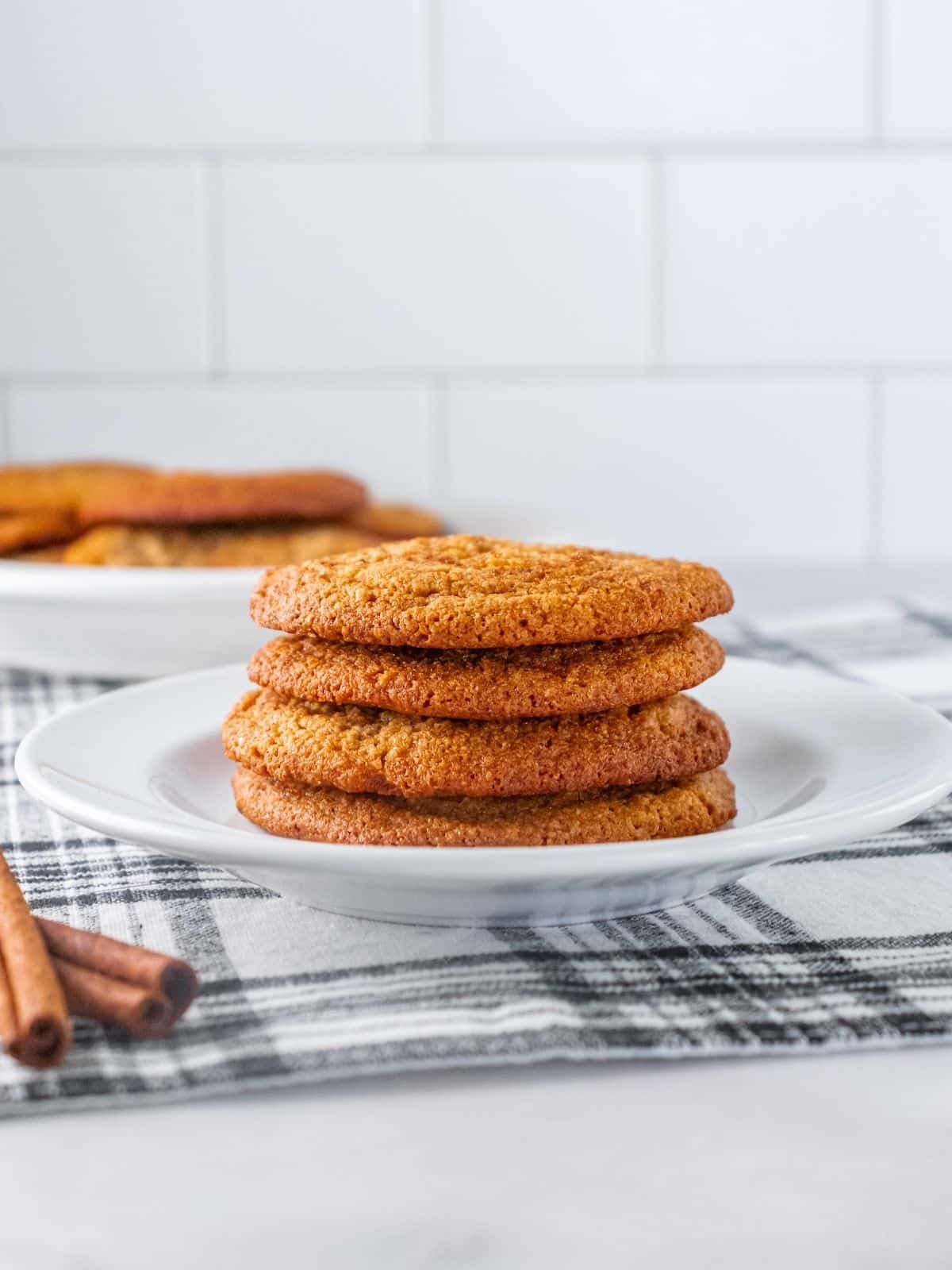 A stack of healthy gluten-free snickerdoodles on a plate.