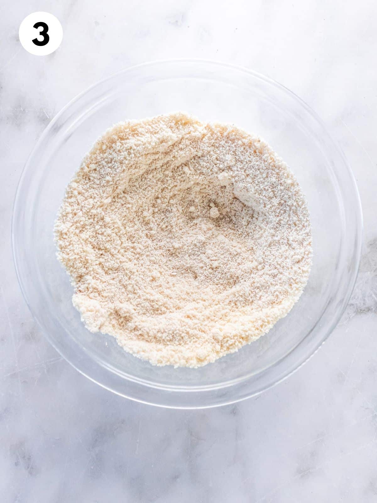 Dry ingredients whisked in a bowl. 