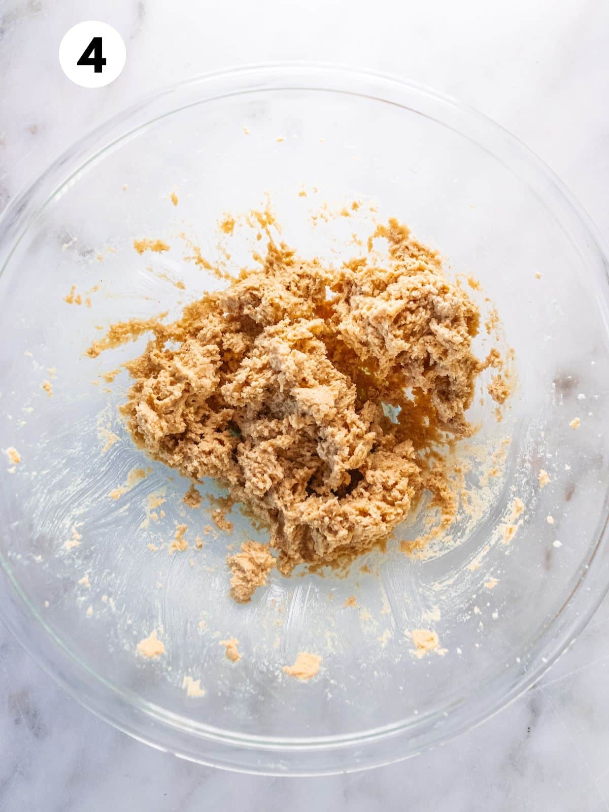 Fully mixed snickerdoodles cookie dough in a bowl.