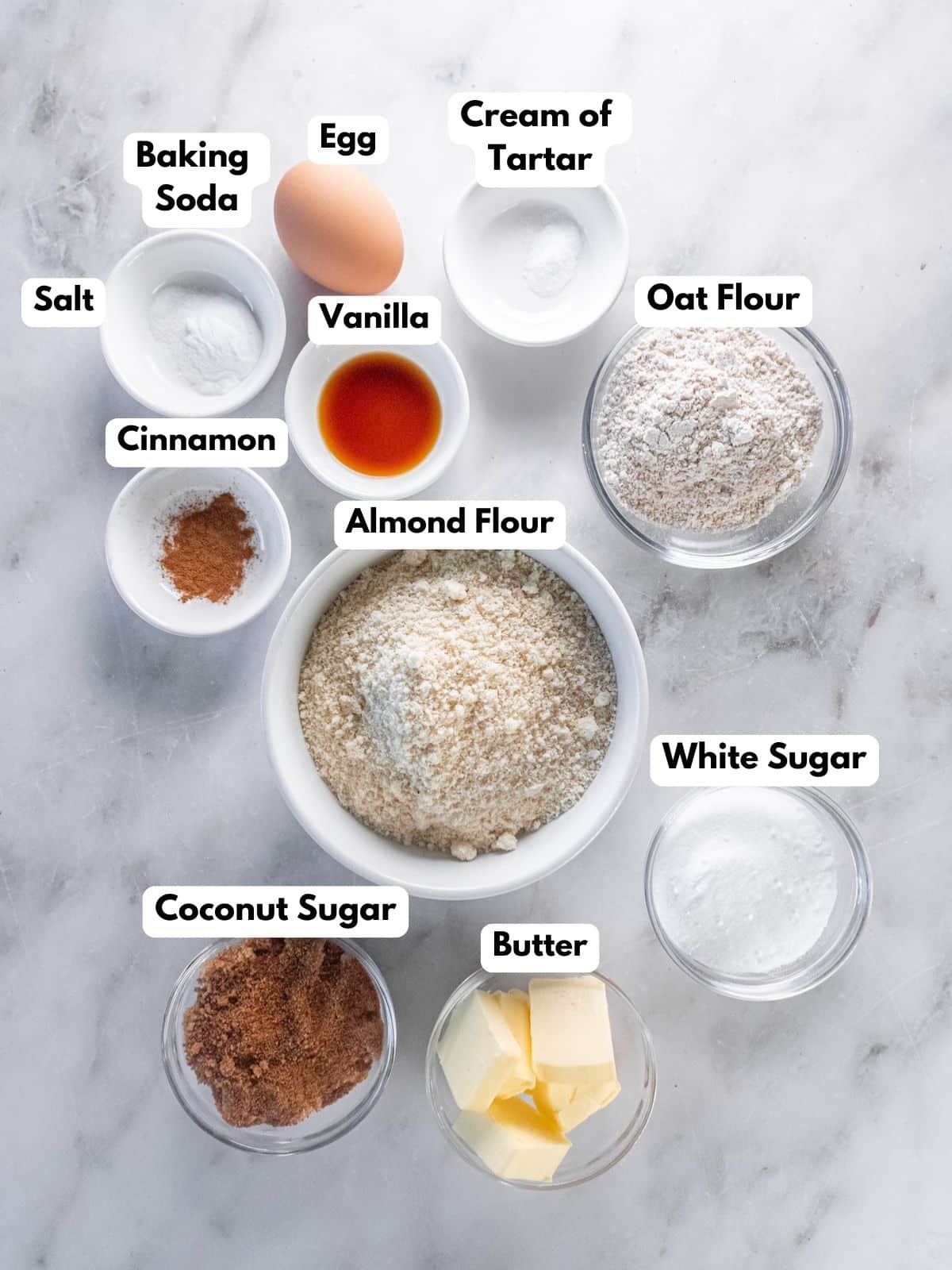 Ingredients to make gluten-free snickerdoodle cookies on the table. 