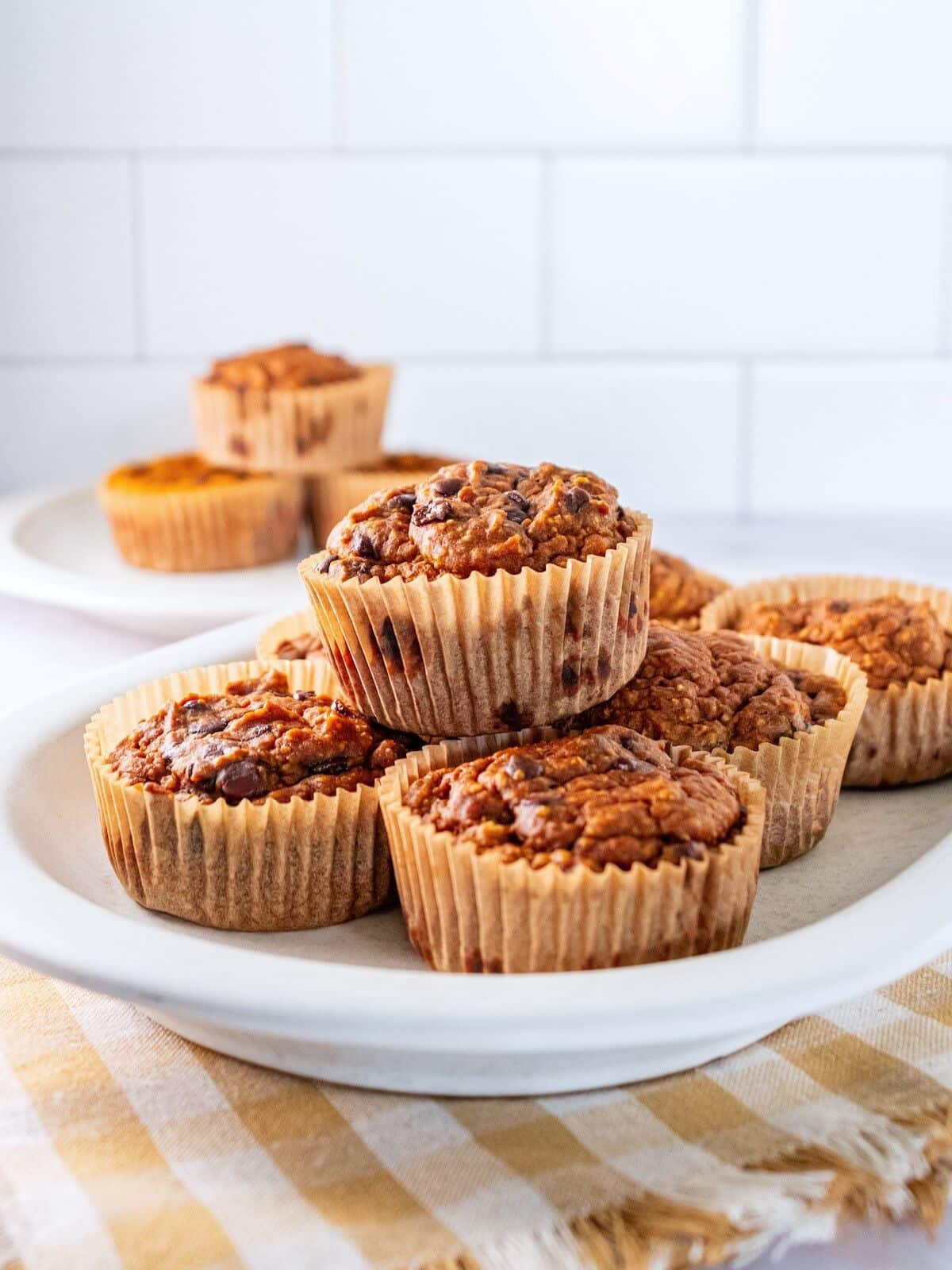 Pumpkin oatmeal muffins on a plate.