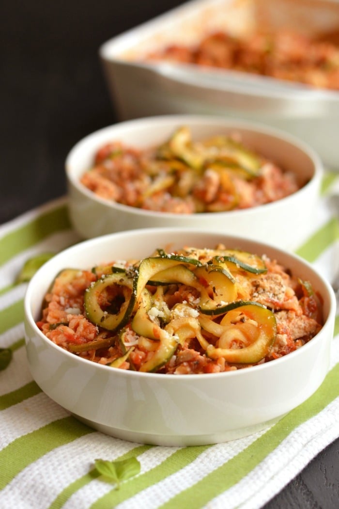 Low Calorie Italian Casserole made with zucchini, brown rice and artichokes is an easy, make ahead freezer casserole. A nourishing, healthy dinner that's filling & bursting with Italian flavorings. Gluten Free + Low Calorie