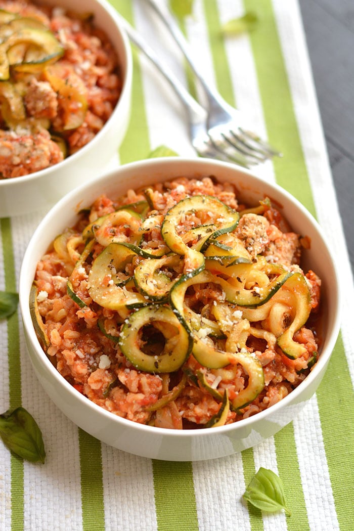 Low Calorie Italian Casserole made with zucchini, brown rice and artichokes is an easy, make ahead freezer casserole. A nourishing, healthy dinner that's filling & bursting with Italian flavorings. Gluten Free + Low Calorie