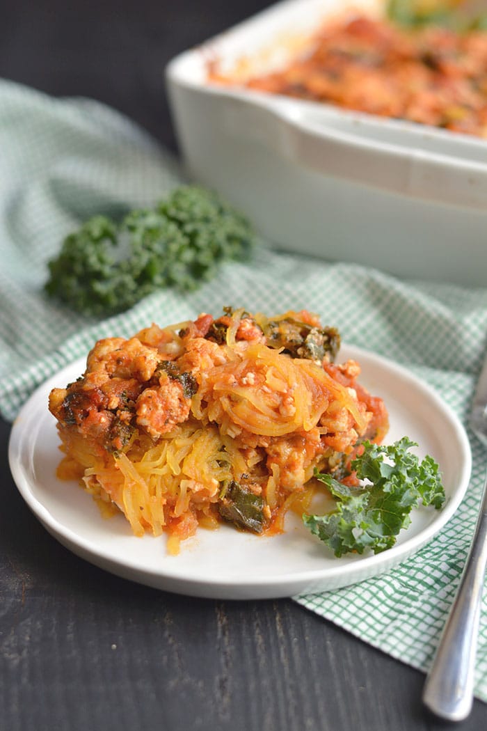 Paleo Spaghetti Squash Lasagna! A healthy casserole perfect for a make ahead meal. Easy to make, packed with protein, feeds a crowd and is freezer friendly! Gluten Free + Paleo + Low Calorie