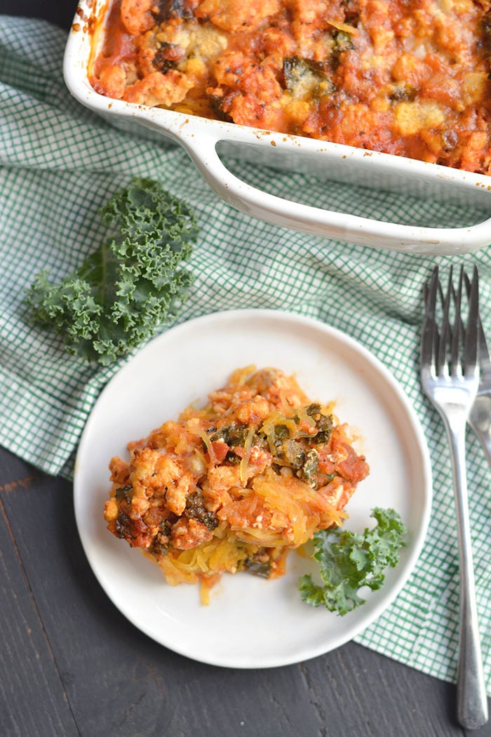 Paleo Spaghetti Squash Lasagna! A healthy casserole perfect for a make ahead meal. Easy to make, packed with protein, feeds a crowd and is freezer friendly! Gluten Free + Paleo + Low Calorie