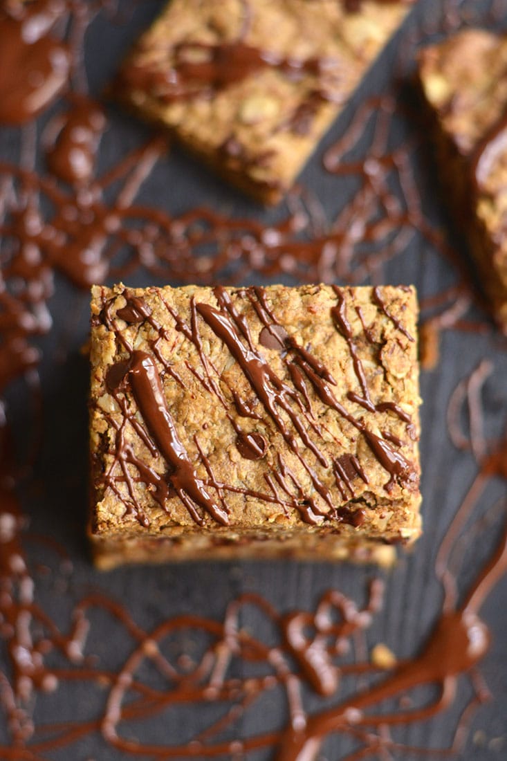Chocolate Peanut Butter Granola Bars with protein & oats! Loaded with complex carbs, healthy fat & protein, this homemade granola bar recipe is perfect for healthy breakfast or snack! Gluten Free + Low Calorie + Vegan