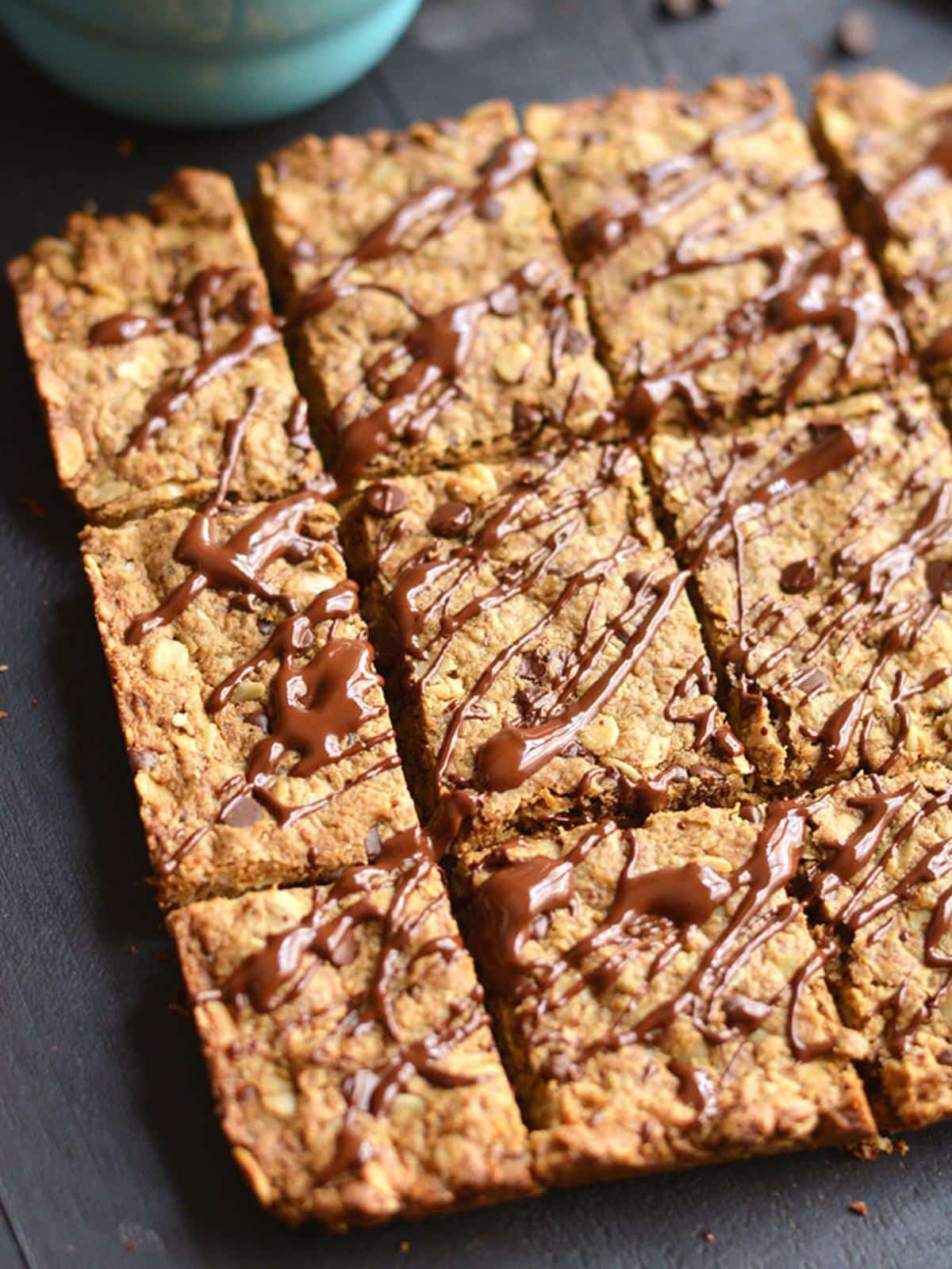 Peanut butter chocolate chip granola bars cut into squares.