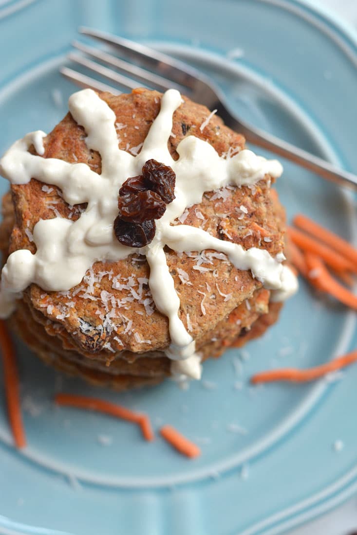 Healthy Carrot Cake Pancakes! These moist, mildly spiced pancakes taste like real carrot cake only in breakfast form & better for you too! Gluten Free + Low Calorie