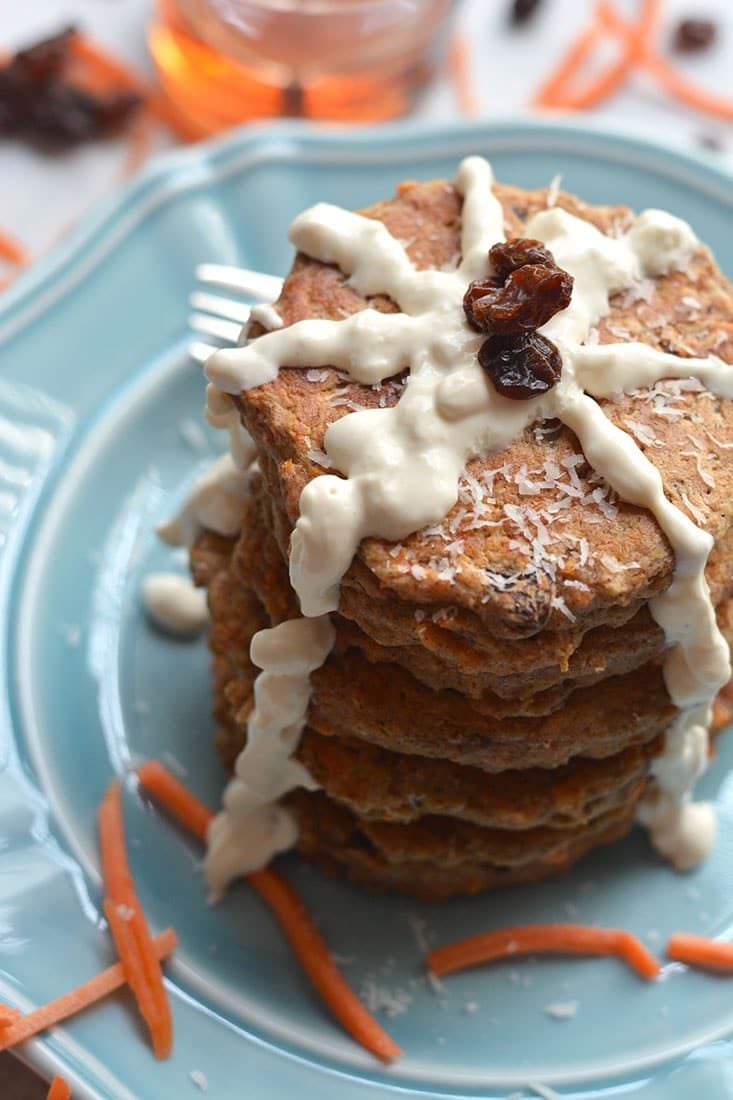 Healthy Carrot Cake Pancakes! These moist, mildly spiced pancakes taste like real carrot cake only in breakfast form & better for you too! Gluten Free + Low Calorie