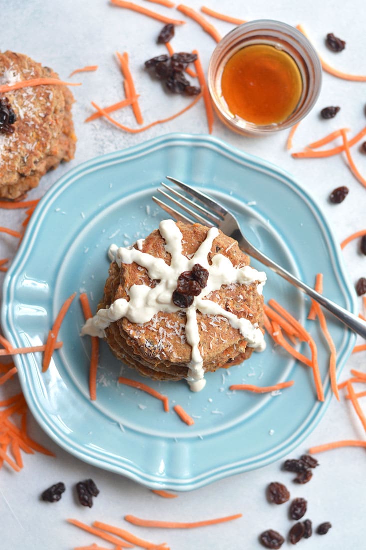 Healthy Carrot Cake Pancakes! These moist, mildly spiced pancakes taste like real carrot cake only in breakfast form & better for you too! Gluten Free + Low Calorie