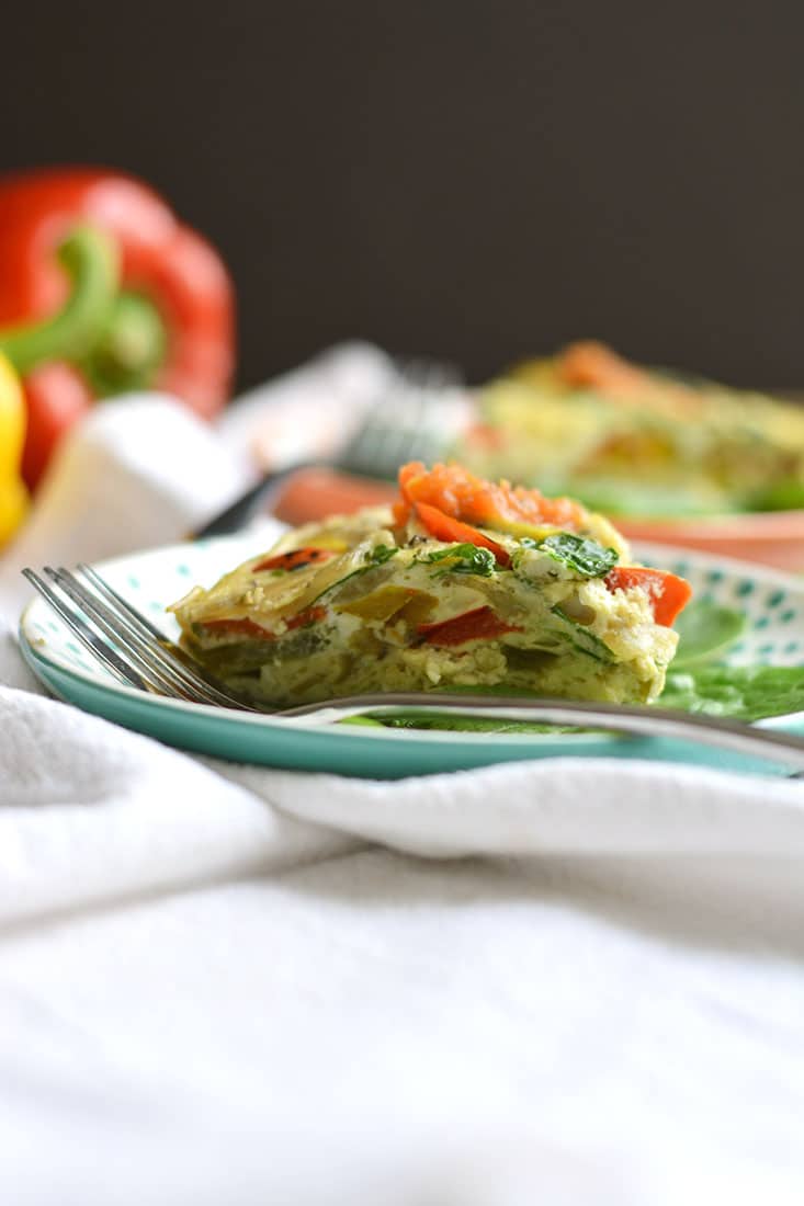 Crockpot Veggie Omelet! Make breakfast easy by letting the slow cooker do the work! This simple make ahead breakfast is loaded with vegetable & protein. The perfect way to start the day. Paleo + Gluten Free + Low Calorie!